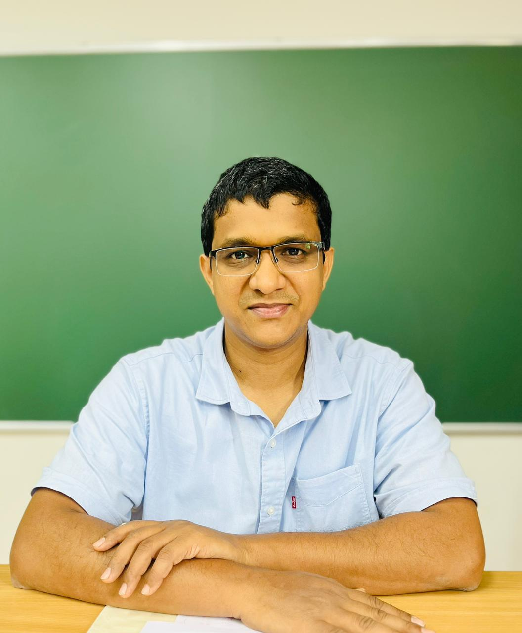 Dr Anoop George